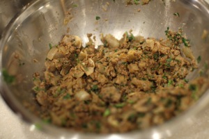 The stuffing cooling down in a mixing bowl